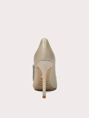 Beige high-heeled shoe with a decorative heel on a white background