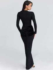 Minimalist editorial styling of a long-sleeve ruched maxi dress for premium dinners or gallery evenings.