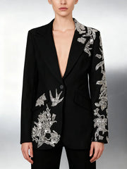 Tailored black blazer featuring beaded embellishment