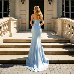 Side slit detail on a light blue satin mermaid evening gown styled for a formal party