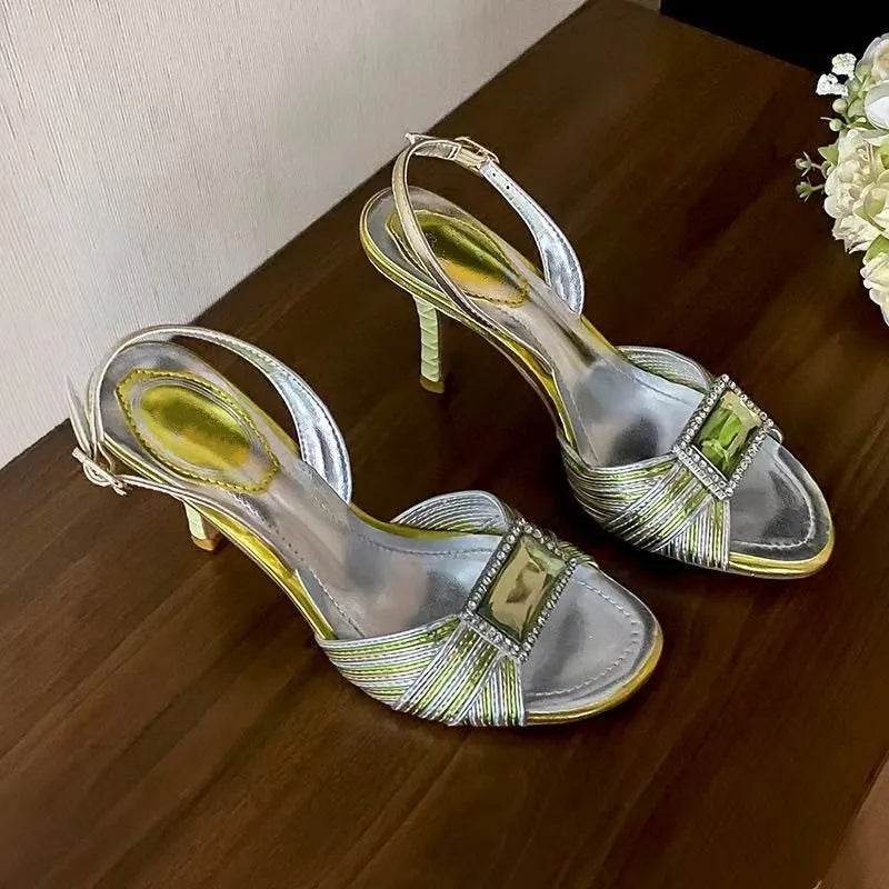 Emerald gemstone silver stiletto sandals for evening events