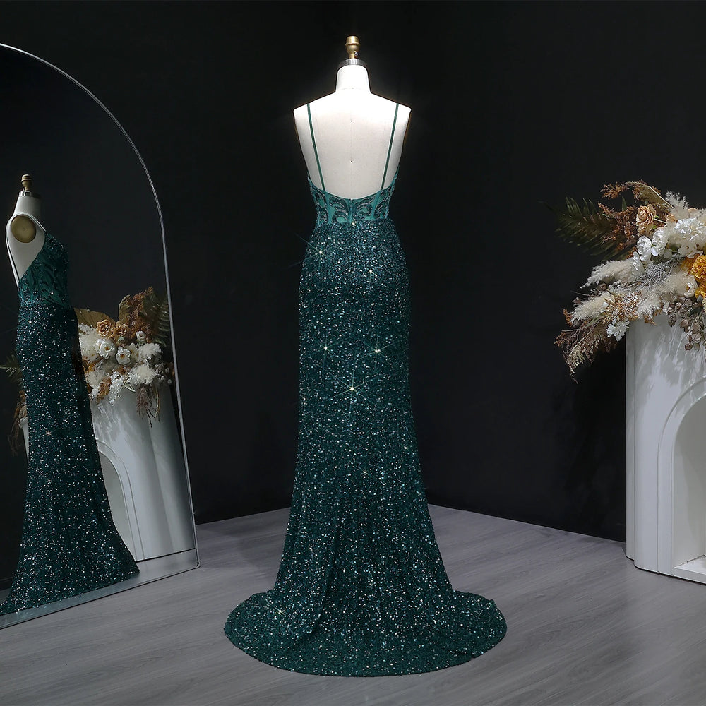 Open-back evening dress with shoulder straps and light-catching sequins