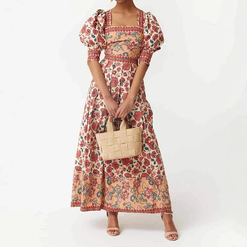 Empire waist floral midi dress shown for picnic ready holiday style