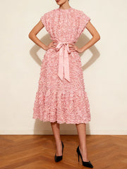 Empire waist purple occasion dress with floral texture and belt