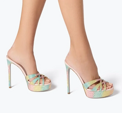 Model wearing rainbow crystal embellished platform heels