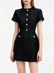 A fit-and-flare mini dress highlighting waist emphasis and soft hem movement.