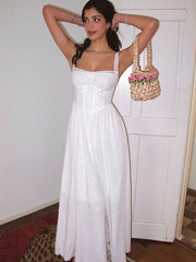 Fit and flare camisole dress shown with adjustable straps indoors