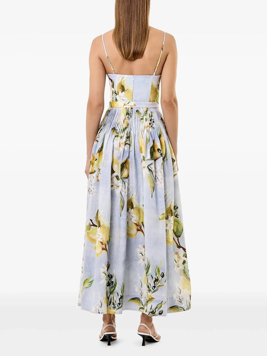 Woman wearing a slim fit top with an A-line skirt styled for a garden party with a white background