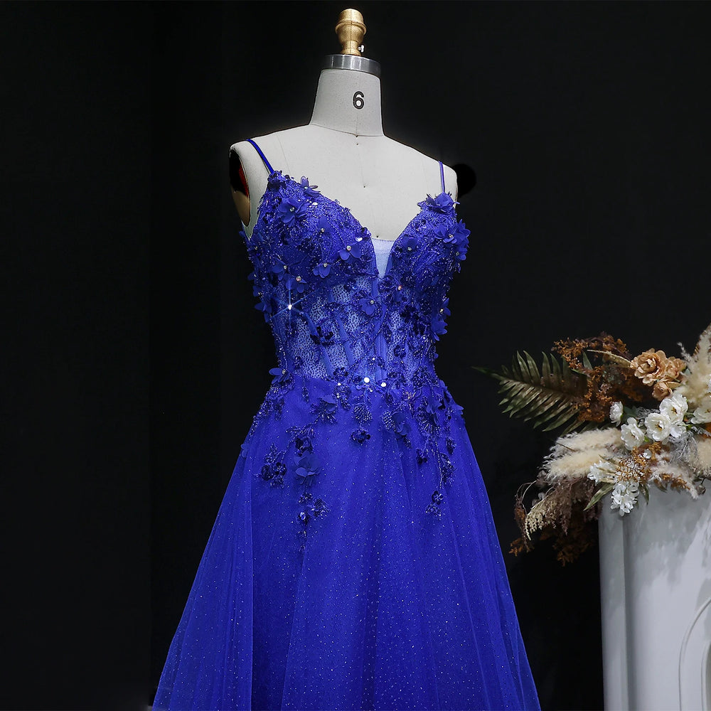 Formal tulle gown with embellished bodice and softly draped full skirt