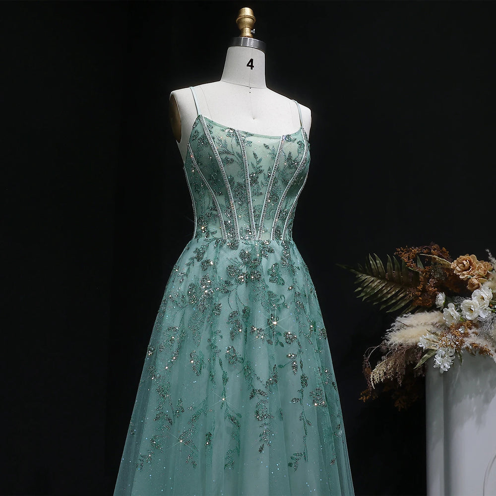 Formal tulle gown with embellished bodice and softly draped full skirt