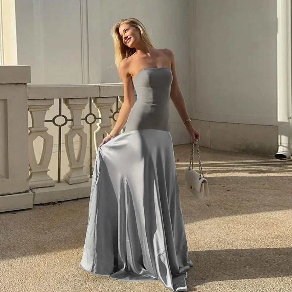 Floor-length formal dress in grey styled for special occasions