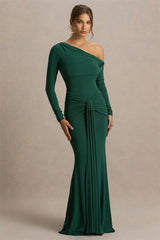 Full-length view showing the gown’s fluid hem and sleek fit, styled with minimal accessories for a formal evening look.