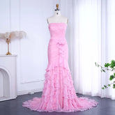Floor-length mermaid evening gown with strapless neckline and sweep