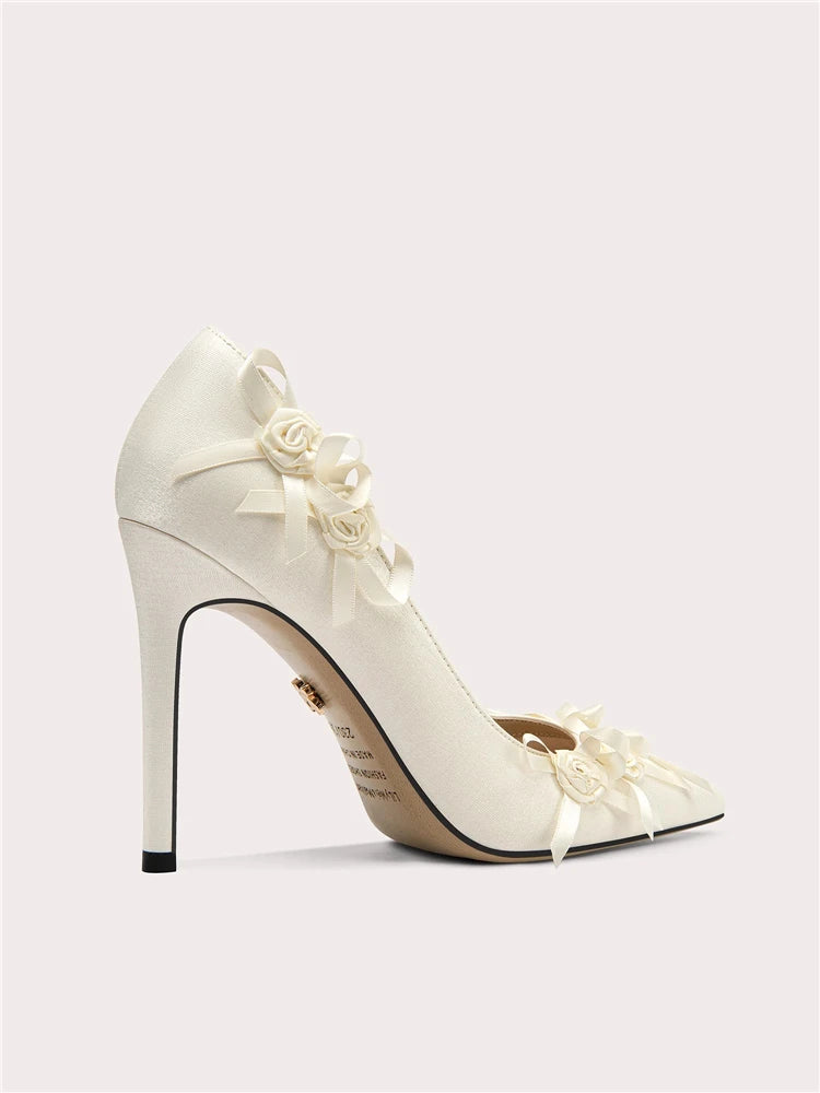 Side view of floral fabric wedding pumps with pointed toe