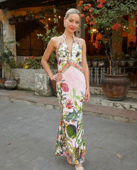 Floral halter backless maxi dress styled for outdoor events