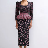 Front view of floral midi dress with peplum waist and long sleeves