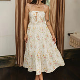 Floral spaghetti strap maxi dress styled for summer vacation