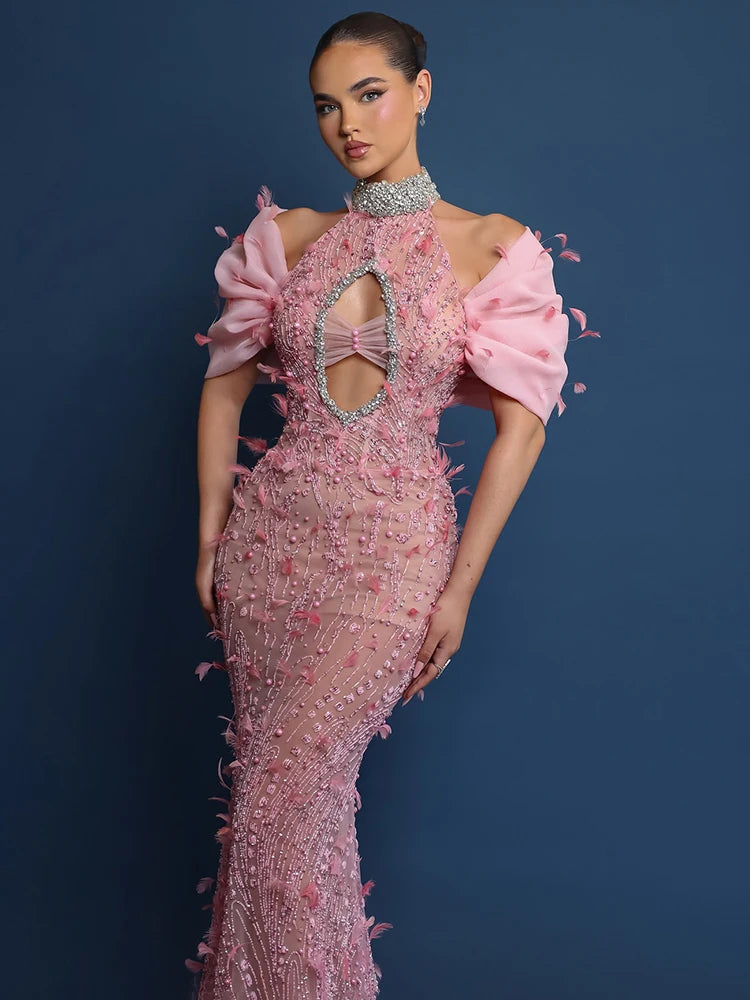 Floral trim beaded evening dress in pink shown for luxury event inspiration