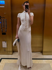 Front view of an ankle-length evening dress with bead detailing