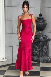 Fuchsia pink slip dress styled for elegant summer parties and weddings