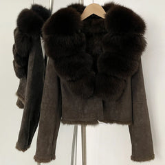 Close-up of the deep brown fur collar highlighting texture, volume, and contrast against the suede body