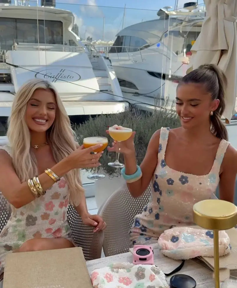 Women's above knee party dress in soft floral tones