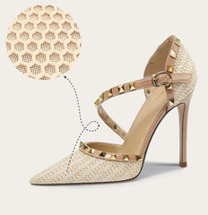 Glossy beige patent sandals with metal stud accents