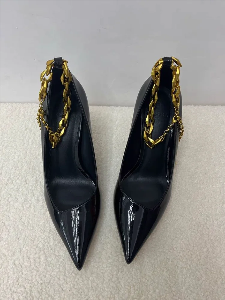 Gold ankle strap high heels in black patent for women’s party looks