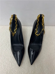 Gold ankle strap high heels in black patent for women’s party looks