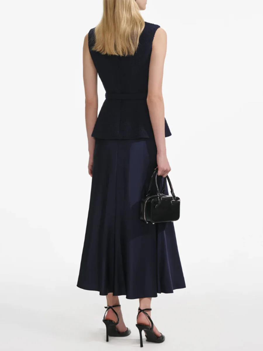 Ankle-length navy skirt with gold buttons for summer workwear