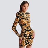 Gold floral velvet mini dress styled for a luxe party look