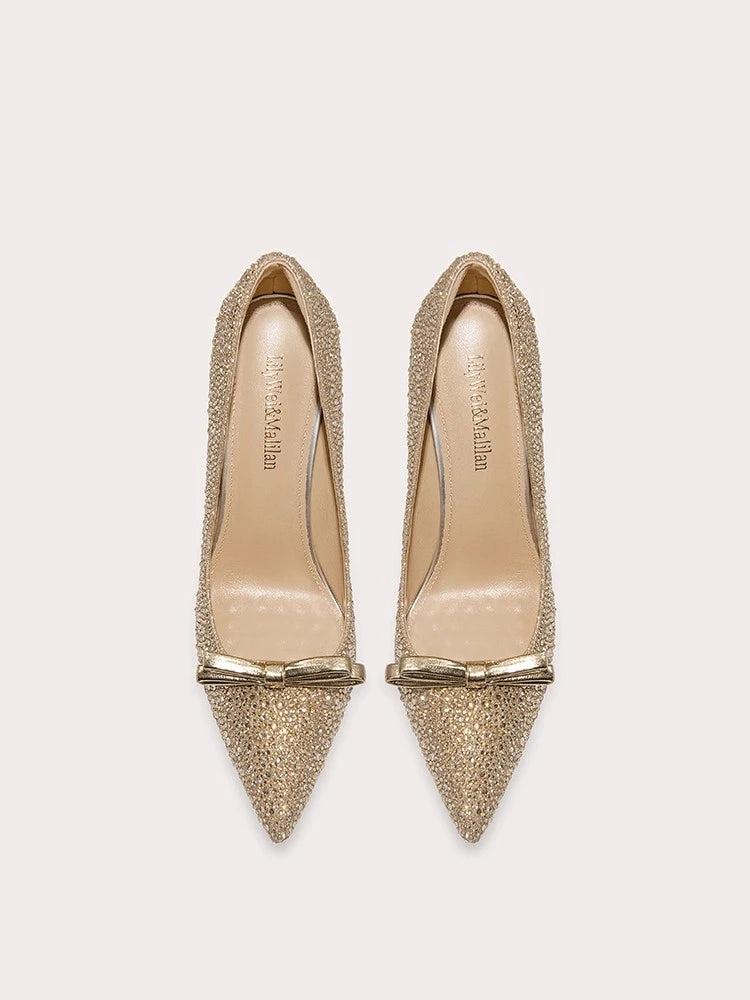 Gold glitter bow pointed pumps styled for party celebrations
