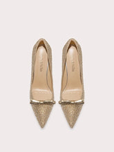 Gold glitter bow pointed pumps styled for party celebrations