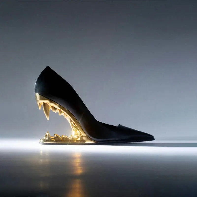 Gold metallic carved heel on black pointed toe party shoes
