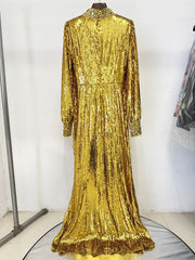 Floor-length gold sheath dress displayed with crystal-like shine.