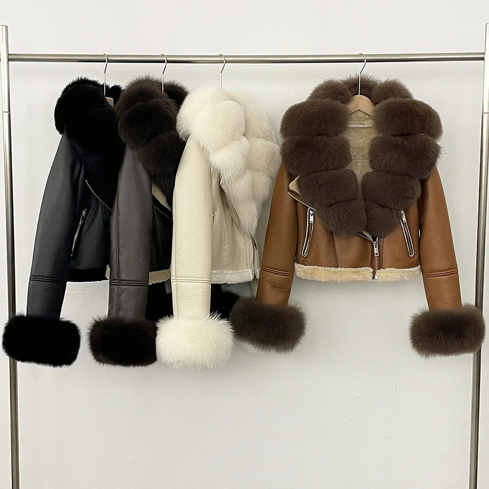 Front view highlighting structured seams, zip closure, and wide cropped hem, finished with soft fur trim at the sleeves.