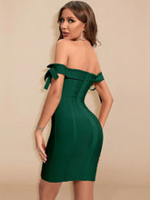 green ribbon tie bodycon mini dress styled for parties