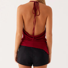 A close-up of the halter neck strap detail on the top.
