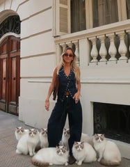 Halter neckline detail on a vest-inspired top with a clean front finish