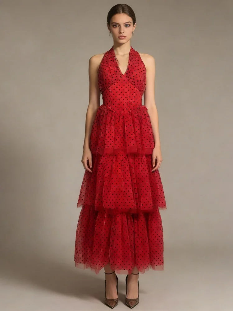 Close view of the layered skirt tiers and dotted fabric texture on the dress