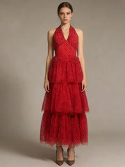 Close view of the layered skirt tiers and dotted fabric texture on the dress