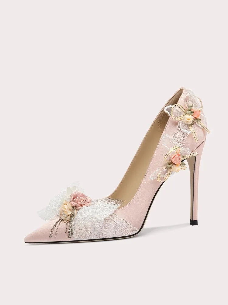 Handmade stiletto party heels in soft pink with 3D floral accents