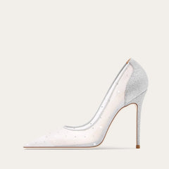 A front view of a high-heel pump, highlighting the thin heel and elegant design.