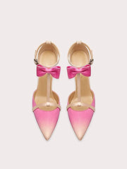 A front view of a high-heel sandal, highlighting the thin heel and elegant design.