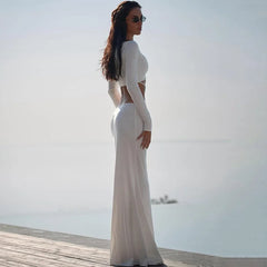 High stretch white knit maxi with sculpted waist cut-outs