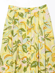 Lightweight floral patterned skirt with yellow, green, and pink colors  set perfect for brunch and beachside strolls on a white background