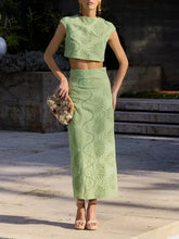 Green hollow-out lace skirt set styled with heels and clutch