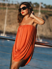 Strapless holiday mini dress styled indoors with minimal heels