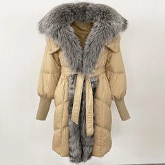 Studio image of a hooded puffer coat with clean lines, extended length, and winter-ready construction