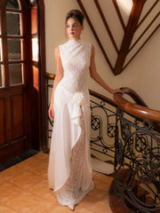 Close-up of the round neckline and lace bodice, highlighting the delicate texture and clean sleeveless cut across the shoulders.